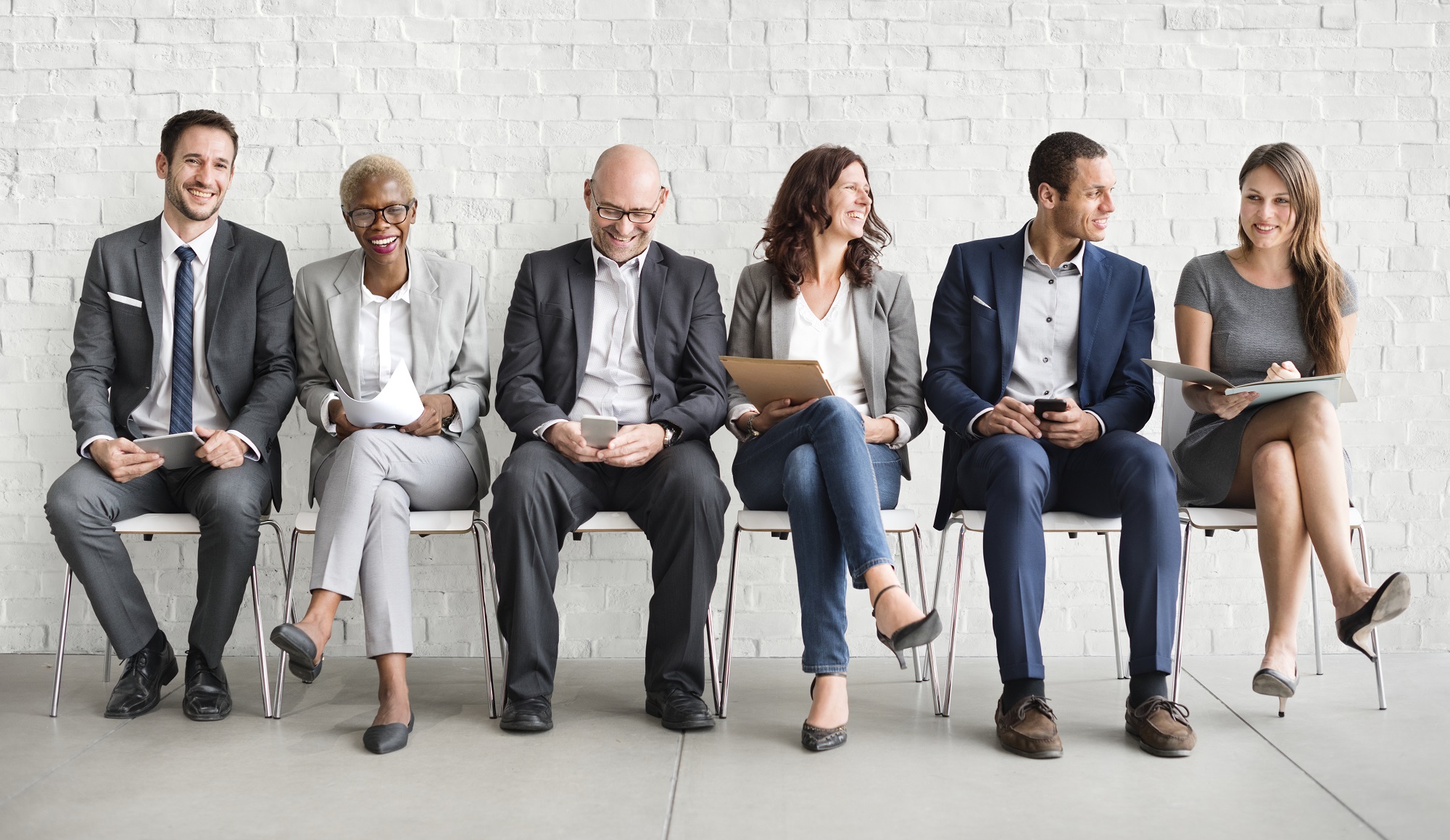 Group of diverse people are waiting for a job interview Surviving Workplace Violence